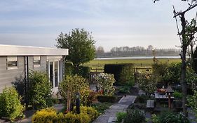 Cottage Geestmerambacht, een nieuw vrijstaande sfeervol en landelijk gelegen vakantiewoning